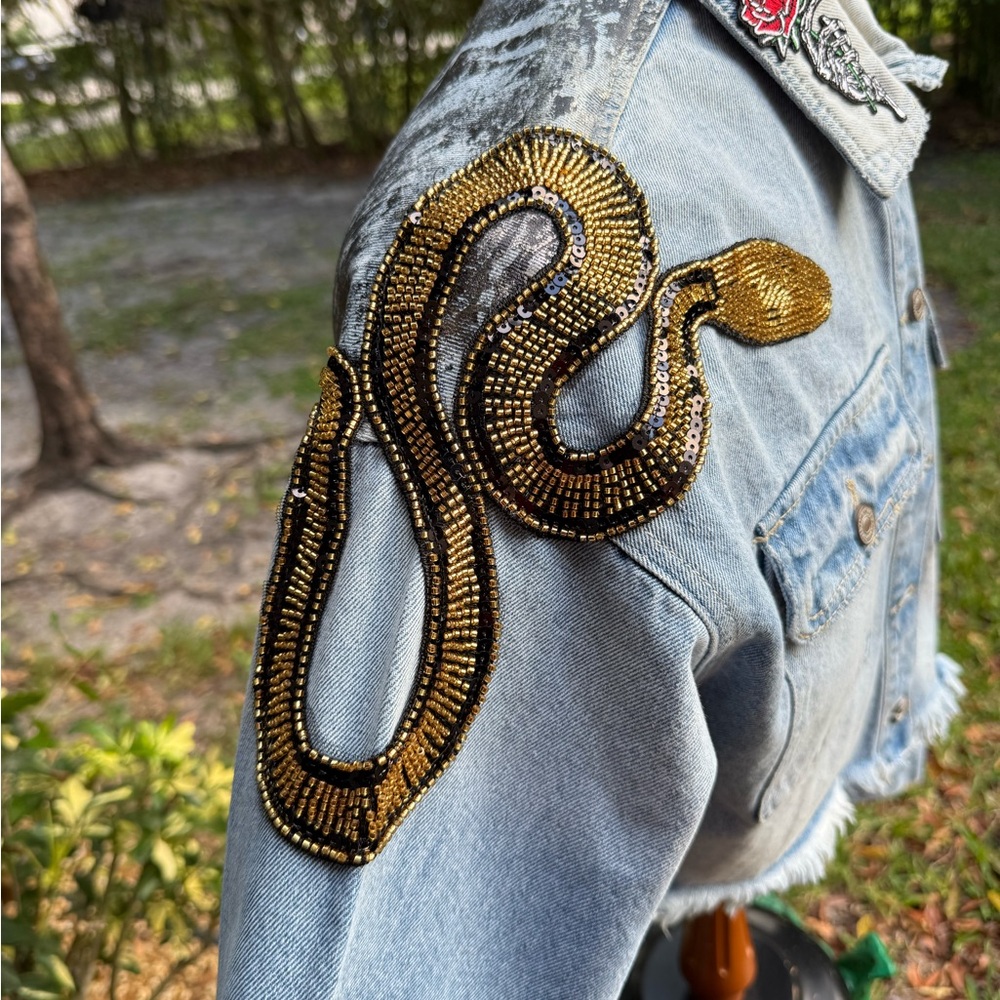 Stylish Denim Jacket with Gold Snake Embellishment